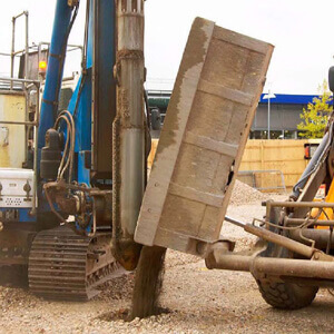 Vibro concrete plugs being installed