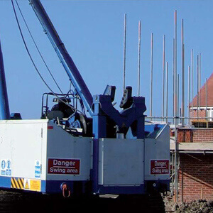 Drivn piling taking place in a residential area