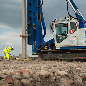 Employee carrying out piling and foundation work