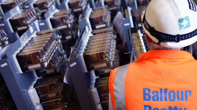 worker overlooking signalling equipment