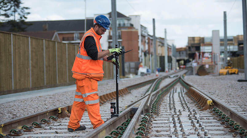 Person inspecting rail track