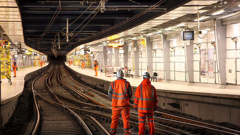 People inspecting rail track
